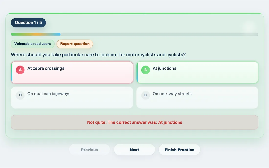 A practice question with the wrong answer in red, the correct answer At junctions in green and a message saying Not quite