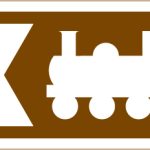 Direction to tourist attraction indicated by a symbol