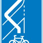 Route for pedal cycles across an entry slip road at a junction ahead