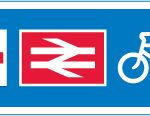 Direction of route to railway and London Underground station for pedestrians and pedal cycles