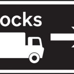 Junction ahead leading to a destination advised for goods vehicles