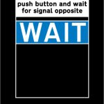 Instructions to pedestrians and cyclists above the push button control at a Toucan crossing