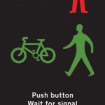 Near side light signals and instructions for pedestrians and cyclists at a Toucan crossing