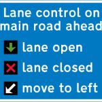 Lane control signals in operation on the road extending from the junction ahead