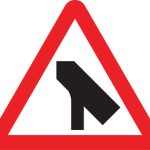 Traffic merges ahead onto main carriageway from the left