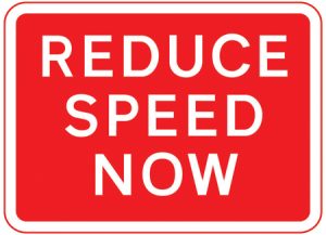 Reduction in speed necessary for a change in road layout ahead