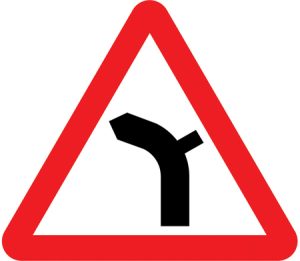 Junction on left bend ahead