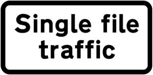 Convergence of traffic to a single file in each direction