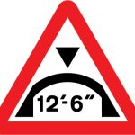 Maximum headroom of 12'-6'' at arch bridge ahead