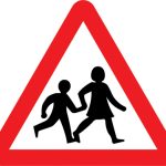 Children going to or from school or playground ahead