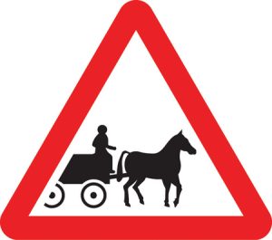 Horse drawn vehicles likely to be in road ahead