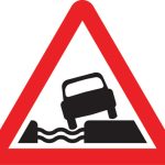 Water course alongside road ahead