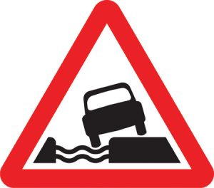 Water course alongside road ahead