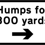 Road humps ahead to the right for 300 yards