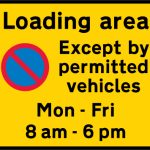 Entrance to a designated off-highway loading area in which waiting restrictions apply