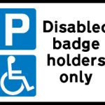 Parking place reserved for disabled badge holders