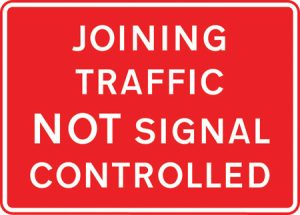 Traffic joining a length of road being controlled by portable traffic signals is not controlled by these signals