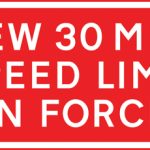 Commencement point of a newly imposed 30 miles per hour speed limit which is contiguous to an existing 30 miles per hour speed limit