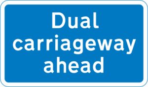 Section of dual carriageway road begins ahead