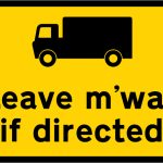 Goods vehicles may be directed to leave the motorway at the junction ahead