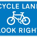 Cycle lane with traffic proceeding from right (pedestrian reminder)