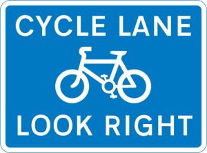 Cycle lane with traffic proceeding from right (pedestrian reminder)