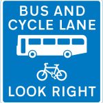 Contra-flow bus lane which pedal cycles may also use with traffic approaching from the right (reminder for pedestrians)