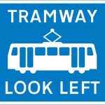 Warning for pedestrians to look out for tramway traffic approaching from the left
