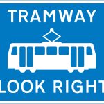 Warning for pedestrians to look out for tramway traffic approaching from the right